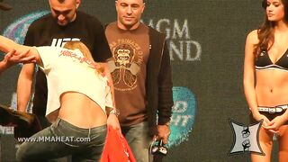 Joe Rogan tries not to stare at Ronda Rousey as she strips for her weigh in