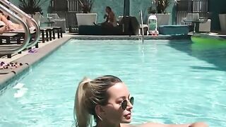 Lindsey Pelas coming out of the pool