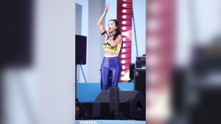 Korean dancer in tight yellow top & blue pants