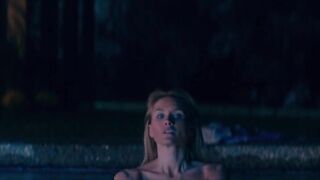 Nicky Whelan goes topless in the pool