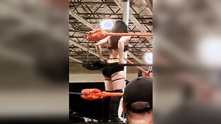 Priscilla Kelly adjusting her shorts