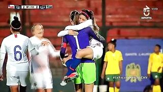 Chilean goalkeeper Tiane Endler, carrying her team