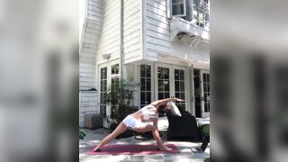 Kate Beckinsale practicing yoga.