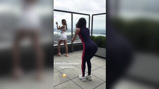 Jen Selter bending over while taking photos