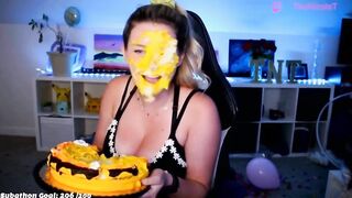 Twitch streamer smashes a whole cake in her face, then plays with it for a bit