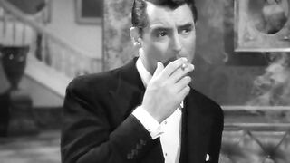 Cary Grant lighting a smoke, Notorious 1946
