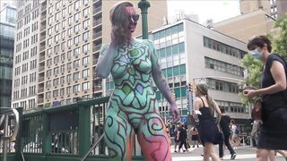 Girl walks around in nothing but body paint in crowded NYC