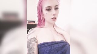 informal girl with pink hair just from the shower