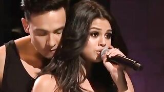 Just look at the dancer's face , even he is having a super tough time resisting Selena Gomez.