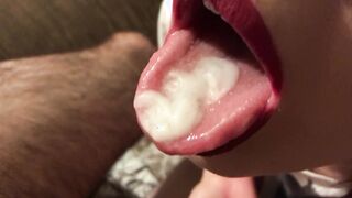 Closeup cum on tongue