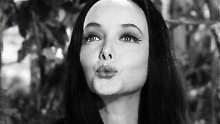Happy Halloween. Here's the unbelievably beautiful Carolyn Jones as Morticia Addams for your spooky day!