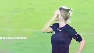 Female ref pranks player by pretending to give him a card. Fernanda Colombo