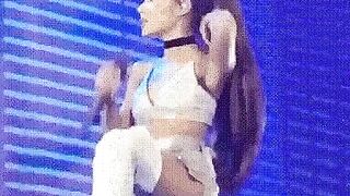Ariana Grande flipping her trademark bj-handle