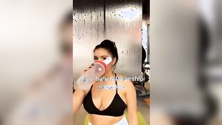 That sports bra can barely contain Ariel Winter's tits!