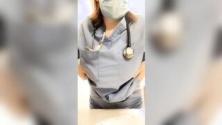 Nurse showing boobs at work