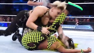 Rhea Ripley's pin on Naomi